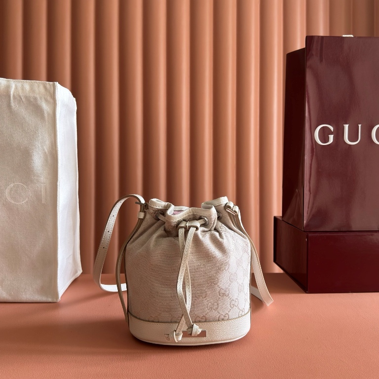 Mini Bucket Bag with Gucci Plaque-001